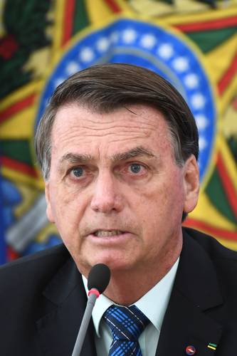 El presidente Jair Bolsonaro en conferencia de prensa, ayer. Foto Afp