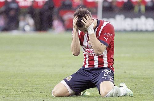 Alan Mozo reacciona frustrado tras la atajada del portero de los Tigres, Nahuel Guzmán.