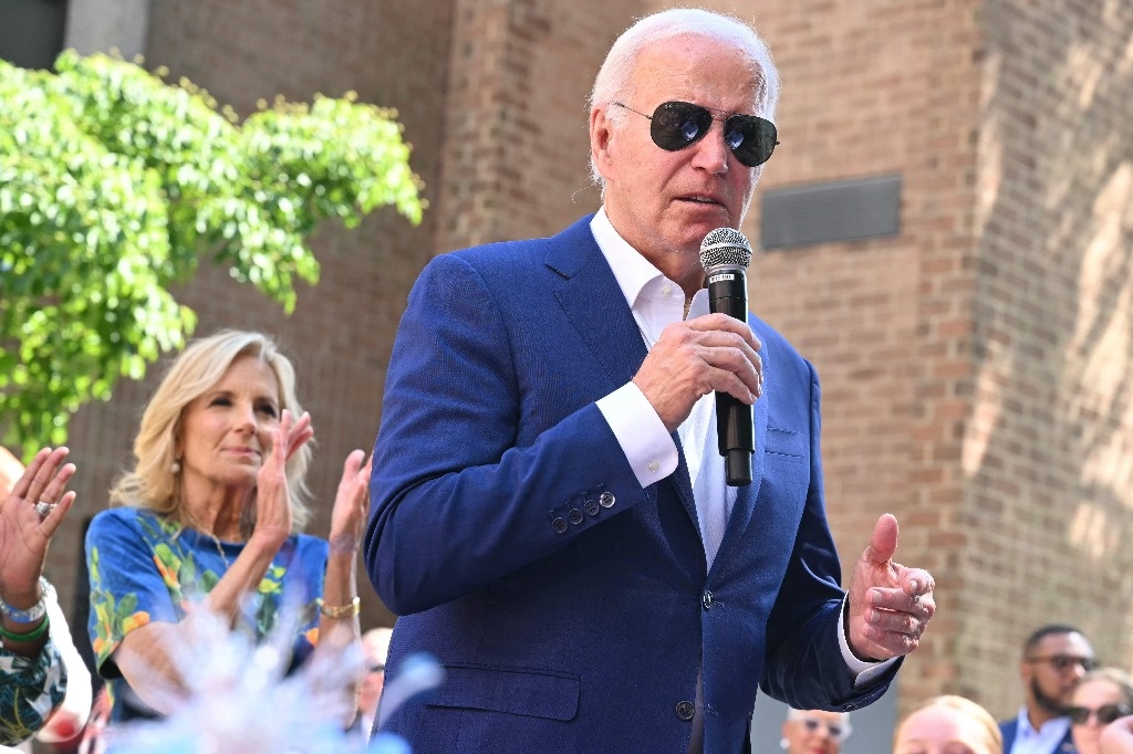 Biden rejects rising refrain in his celebration for him to step apart