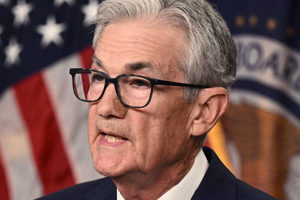 Time to cut interest rates, Powell says