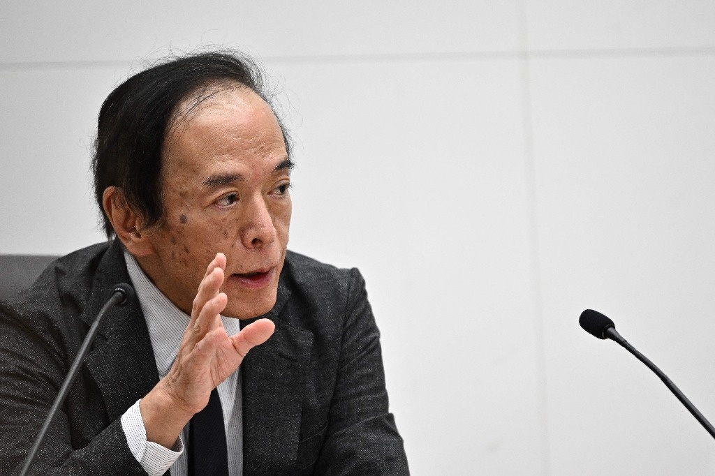 Japan keeps interest rates stable; revises consumption up