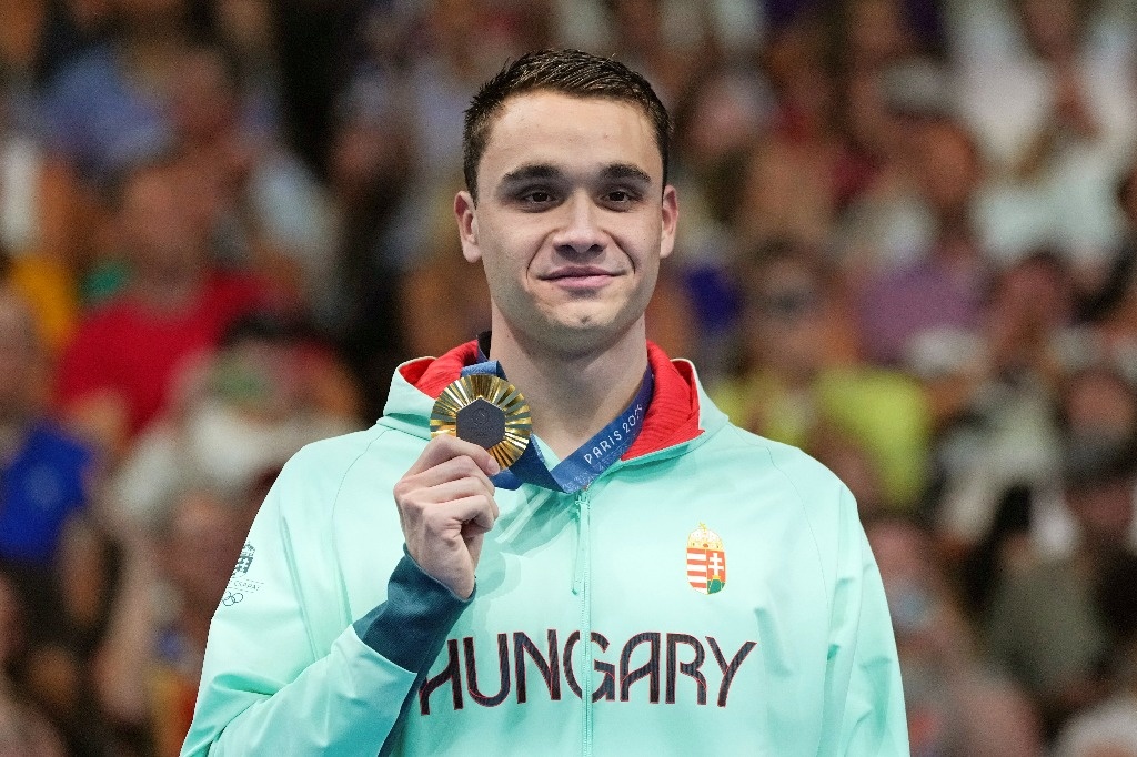 Hungary’s Kristof Milak takes gold in the 100m butterfly