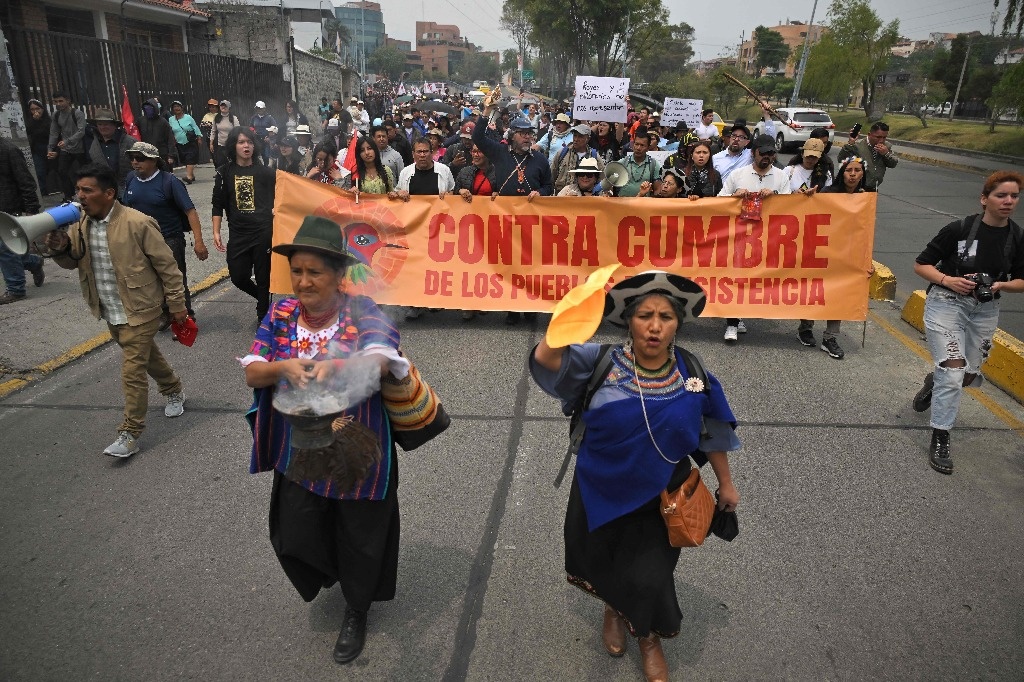 Demonstrators protest against the XXIX Ibero-American Summit in Ecuador