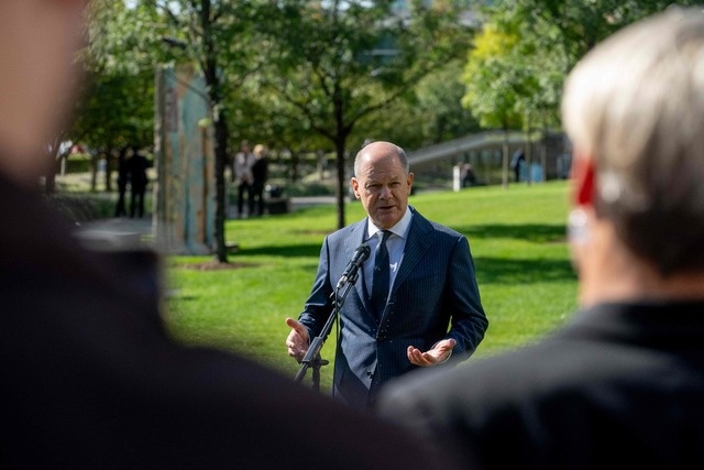 Olaf Scholz narrowly wins regional election