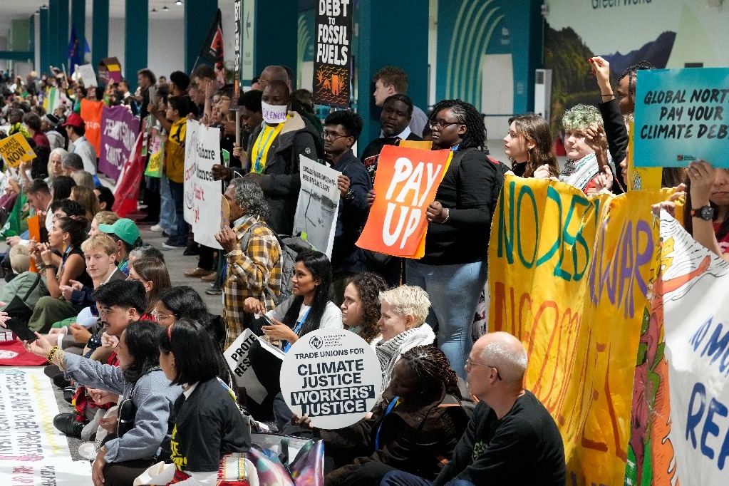 Activists protest at UN climate summit in Baku