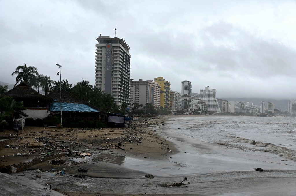 Hurricane ‘John’ downgraded to tropical storm