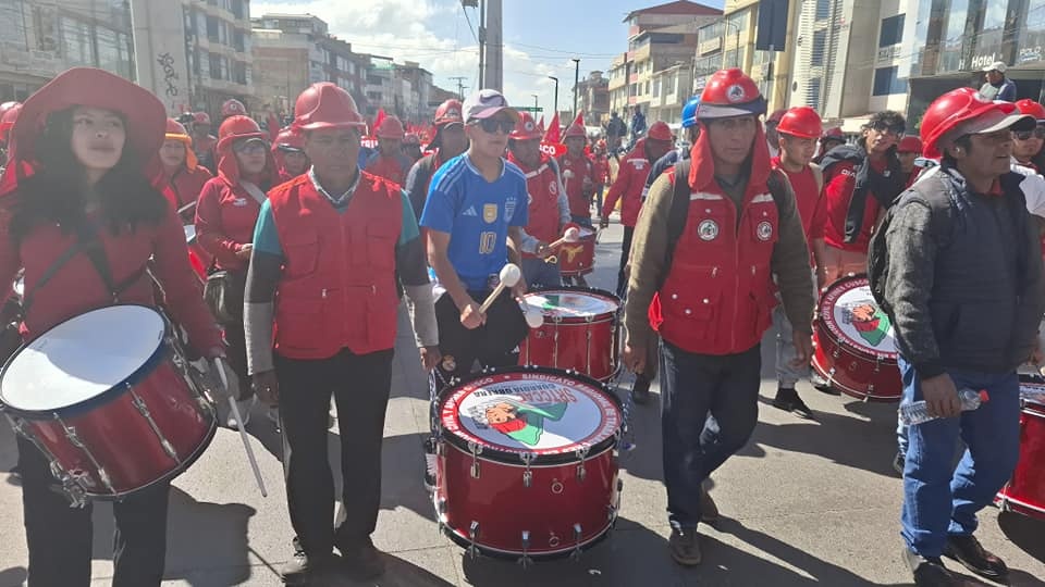 Construction workers march in Peruvian cities