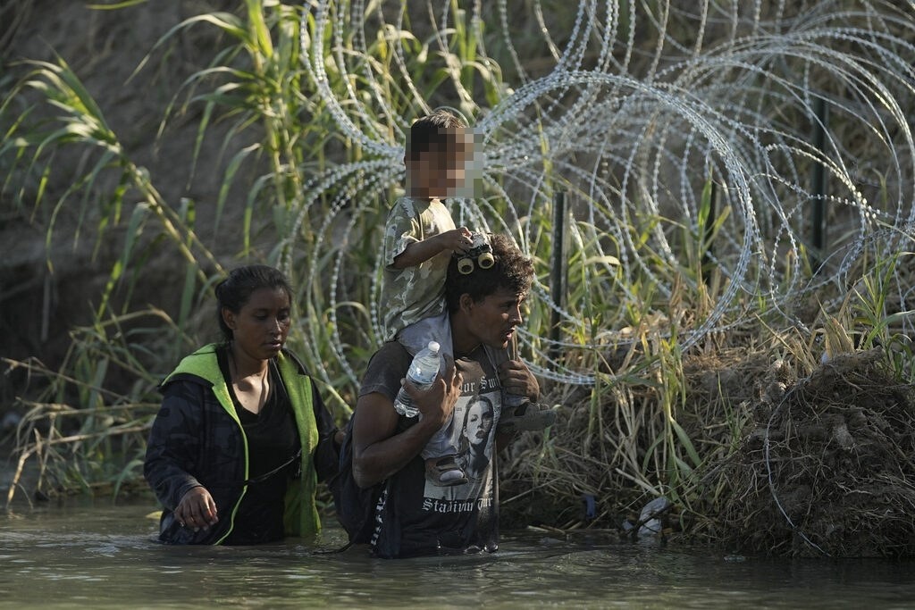 Texas triples barbed wire fences against migrants